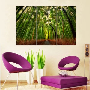 May include: A three-panel canvas print depicting a path through a lush green bamboo forest. The path is lined with tall bamboo stalks and the sunlight filters through the leaves, creating a dappled effect.