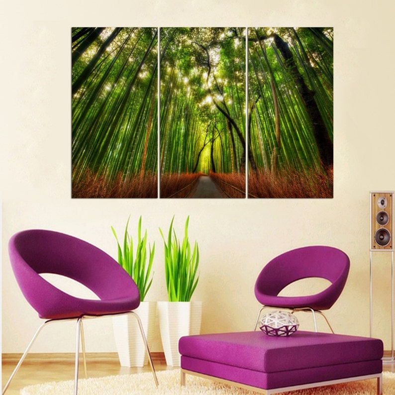 May include: A three-panel canvas print depicting a path through a lush green bamboo forest. The path is lined with tall bamboo stalks and the sunlight filters through the leaves, creating a dappled effect.