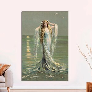 May include: A woman in a flowing white dress with a floral crown stands in the ocean. The water is a light blue and green colour, and the sky is a light blue. The woman's hair is long and flowing, and she has a serene expression on her face.
