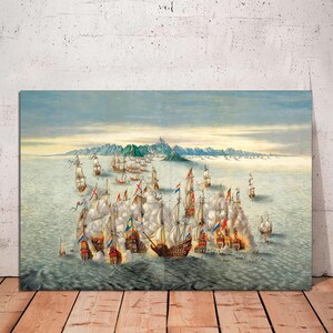 May include: A painting depicting a naval battle scene with numerous ships, some with billowing sails, engaged in combat. The ships are surrounded by smoke and water, creating a sense of chaos and action. The scene is set against a backdrop of a distant coastline and a cloudy sky.