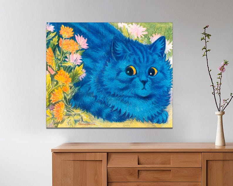 May include: A blue cat with yellow eyes is lying down in a field of flowers. The cat is surrounded by yellow and pink flowers. The cat's fur is very fluffy and soft. The painting is by Louis Wain.