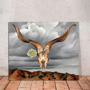May include: A painting of a white flower and a brown animal skull with large horns against a backdrop of gray clouds and a brown landscape.