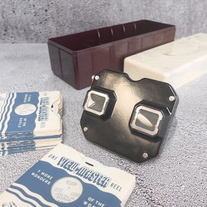 View-Master Set – Sawyer&#39;s Black Art Deco Viewer + Purple Marble Bakelite Case with 35 Classic Reels - Old Toy collectors, memorabilia