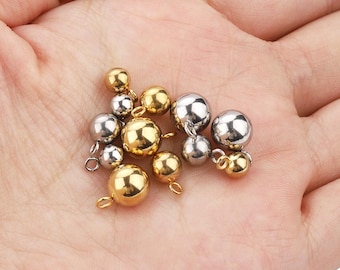 100 unidades de dijes de bola de acero inoxidable chapados en oro de 18 quilates con anilla cerrada, dijes para pulseras y collares de 3/4/5/6/8 mm.