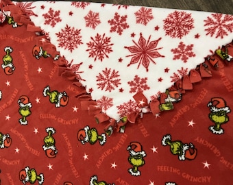 Dr. Seuss  “Feeling Grinchy”  2yd No-Sew Fleece Blanket | Double-Sided | Red & White Snowflake Reverse