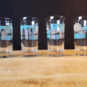 Blue heaven tumbler set of 4 Royal China Inc Sebring,Oh atomic blue and grey