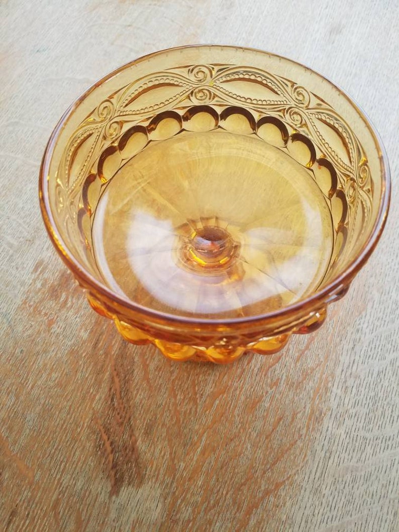 Amber glass pedestal dish candle holder or table centerpiece