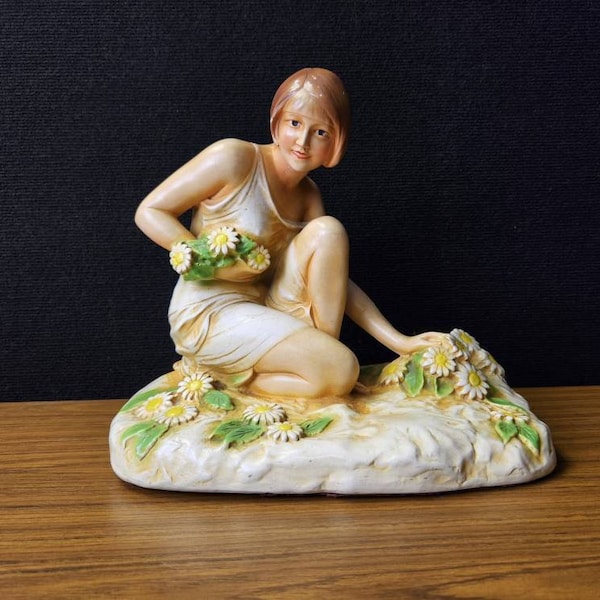 Large chalkware figurine flapper lady in a field of daisies art deco decor