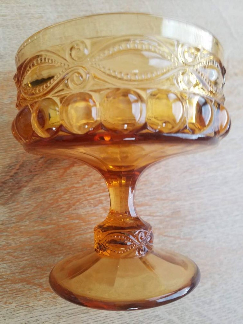 Amber glass pedestal dish candle holder or table centerpiece