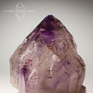 Lustrous Amethyst Phantom Crystal with Hematite