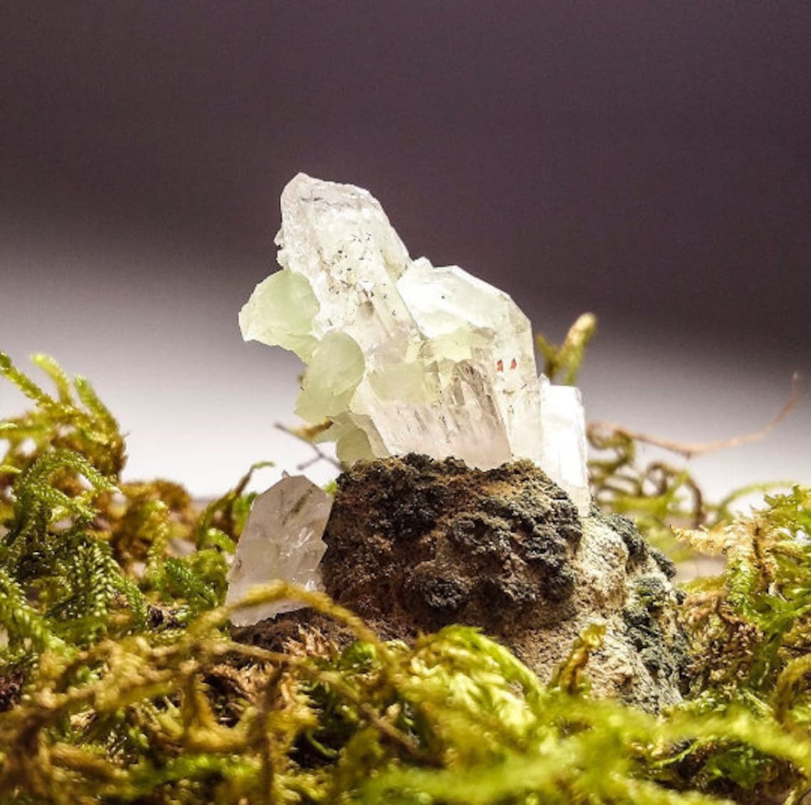 Clear Quartz Crystal Cluster With Prehnite Epidote And Small Red 