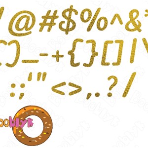 May include: Gold-textured punctuation marks and symbols, including an exclamation point, at symbol, number sign, dollar sign, percent sign, caret, ampersand, asterisk, parentheses, brackets, and more. A logo with the text "Booblyk" is also present.