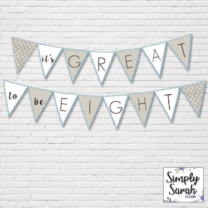 May include: A banner with the text "it's GREAT to be EIGHT" in black letters on white and tan pennants, outlined in light blue. The banner is decorated with patterned pennants on each end and is set against a white brick wall.