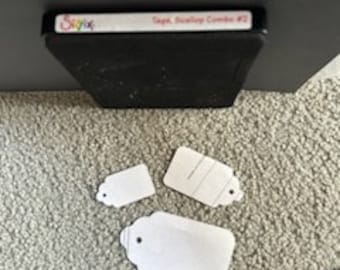 Sizzix Dies including Puzzle, Tree, Scalloped Tags, Tags #3 and 2 smaller dies with Flower and Snowflakes