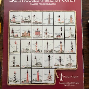 May include: A book cover with a red background and a title that reads "Lighthouses of the East Coast Charted for Needlework". The cover features a grid of 25 small images of lighthouses, each with a different design. The book is published by Tidewater Originals, Needlepoint and Cross Stitch Graphics, Virginia C. Creekman.