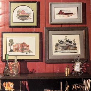 May include: A book cover with the title "R.F.D. Mill, Barns, and Houses" designed by Judith Sandy for Graphique Needle Arts. The cover features four framed cross-stitch patterns of a mill, barns, and houses. The book is priced at $4.00 and is book number 16.