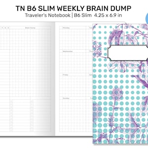 May include: TN B6 Slim weekly brain dump traveler's notebook. The notebook is 4.25 x 6.9 inches. The cover features a floral design with purple and teal accents on a white background with teal polka dots. The interior pages have a grid layout.