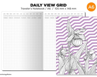 May include: A6 size daily view grid notebook with a purple and white striped cover featuring a black and white line drawing of a flower. The notebook has a grid pattern on the pages and includes the months of the year and days of the week.