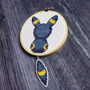 PADRÃO: ponto cruz umbreon com cauda pendurada