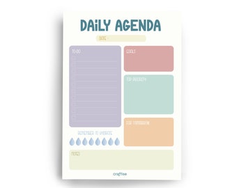 Op de afbeelding: Een printbare dagelijkse agenda-planner met secties voor een to-do-lijst, doelen, topprioriteit, voor morgen, notities en een herinnering om te hydrateren. De planner heeft een lichtblauw, roze, groen en geel kleurenschema.