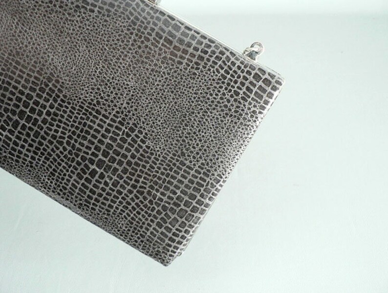 gray snakeskin purse