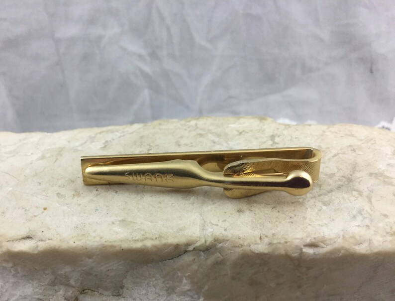 Vintage Midcentury Mens Designer Gold Tone Tie Bar Clasp by Swank Textured Patina with Engraved Detail