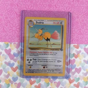 1999 vaporeon pokemon card 1999 Pokmon Team Rocket #45 Dark Vaporeon