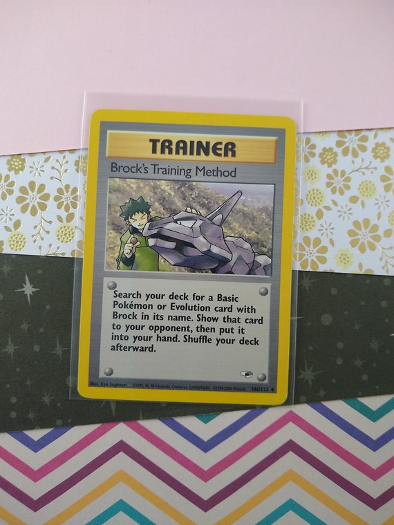 holographic brock trainer card Evolutions 107 Full Art Brock's Grit PSA 8 main image 1