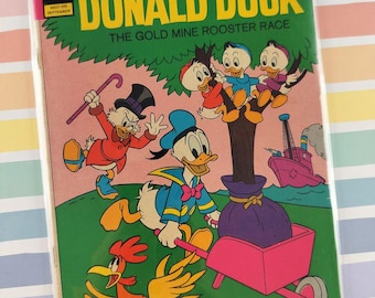 Fumetto vintage Walt Disney Paperino, settembre 1972, n. 145 Gold Key, condizioni da buone a ottime con busta e cartoncino protettivo.