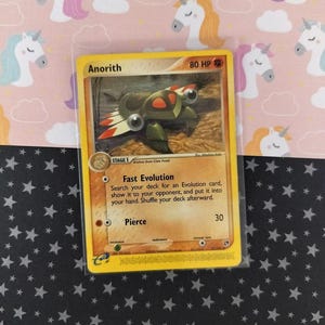 pokemon card anorith Claw Fossil 100/114 Steam Siege Reverse Holo NM Colorless Fossil Drop (30+) You may discard an Unidentified Fossil card from your hand Claw Fossil Anorith (100) 2016