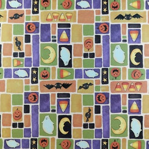 May include: A colorful Halloween-themed patterned paper with a repeating design of ghosts, pumpkins, bats, candy corn, and crescent moons. The pattern is set against a background of orange, purple, green, and brown squares.