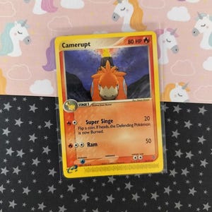 pokemon camerupt card {023/193}Camerupt (Energy Mirror) Fire Eruption (50+) Each player discards the top card of their deck Pokemon Black & White Boundaries