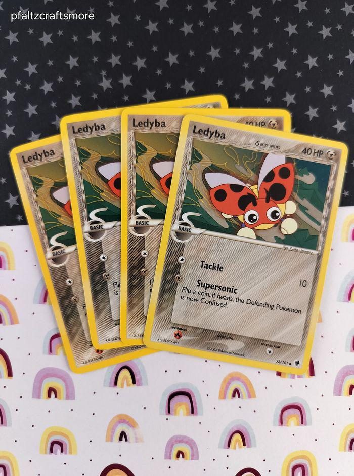 different types of holo pokemon cards 144/142 Ledian main image 1