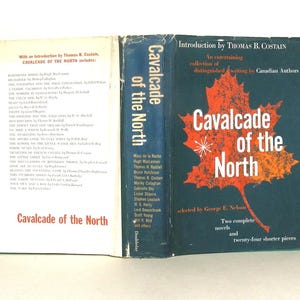 May include: A blue book cover with the title "Cavalcade of the North" in white text. The cover features a red maple leaf with a white star. The book is a collection of short stories and novels by Canadian authors. The book was edited by George E. Nelson.