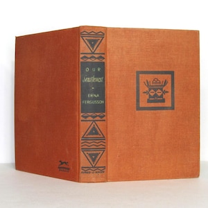May include: A vintage book titled "Our Southwest" by Erna Fergusson. The book has a burnt orange cover with black geometric designs and text. The spine is black with white text. The publisher is Alfred A. Knopf.