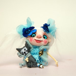 Polymer clay brooch doll