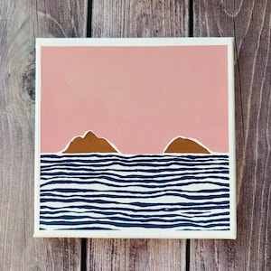 May include: A painting depicting two brown islands in a blue and white striped sea with a pink sky.