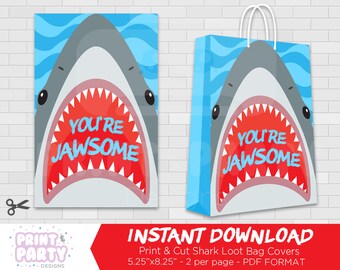 May include: Printable shark loot bag covers in PDF format. The design features a cartoon shark with an open mouth and the text "You're Jawsome". The bag covers are 5.25 inches by 8.25 inches and print two per page.
