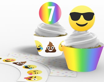 May include: Rainbow cupcake wrappers with emoji designs, including a laughing emoji, a poop emoji, and a sunglasses emoji. A rainbow cupcake topper with the number 7 and a yellow emoji cupcake topper with sunglasses.