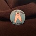 Oh Lawd He Comin' - Fresno Beancrawler Cryptid Kitty 1.5' Pinback Button - Eldritch Beans 