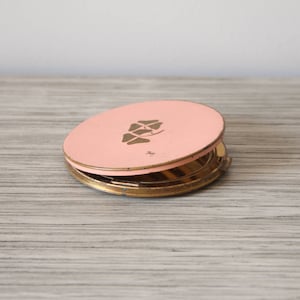 Vintage 50&#39;s Harriet Hubbard Ayer Inc. of NEW YORK Makeup Compact | Brass Body | Interior Mirror | Pink Top | Clover Design | Made in USA