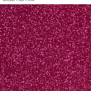 May include: A close-up of a hot pink glitter texture. The glitter is fine and evenly distributed, creating a sparkling effect.