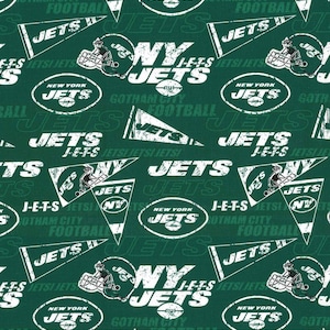 May include: Green fabric with a white repeated pattern of the New York Jets logo, including the team name, helmet, and "J-E-T-S" text. The fabric also includes the words "Gotham City Football" and "New York Jets".