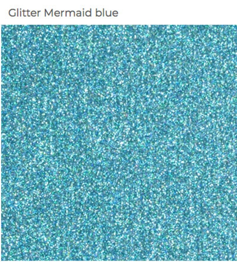 May include: A close-up of blue glitter with a fine texture. The glitter is a light blue color with a slight iridescent sheen.
