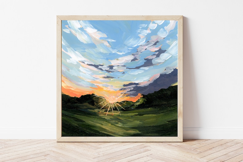 K&ouml;nnte beinhalten: Ein Gem&auml;lde, das einen Sonnenuntergang &uuml;ber einem gr&uuml;nen Feld zeigt, mit einer strahlend orangen Sonne und wei&szlig;en Wolken an einem blauen Himmel.