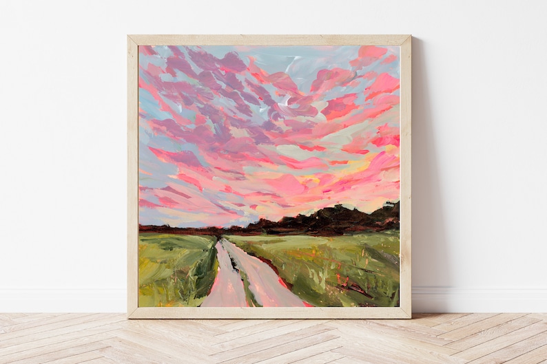 May include: A painting of a pink and purple sunset over a field with a dirt road leading into the distance.