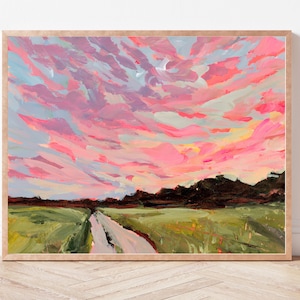 May include: A painting of a pink and blue sunset over a field with a dirt road leading into the distance.