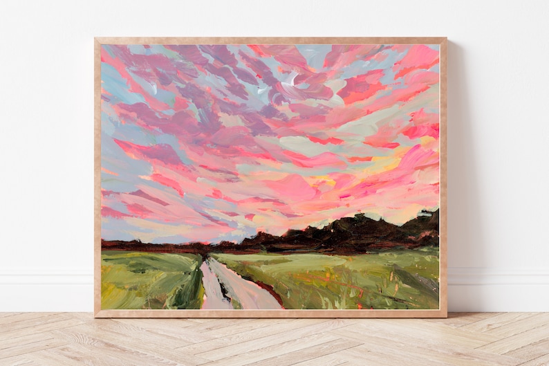 May include: A painting of a pink and blue sunset over a field with a dirt road leading into the distance.