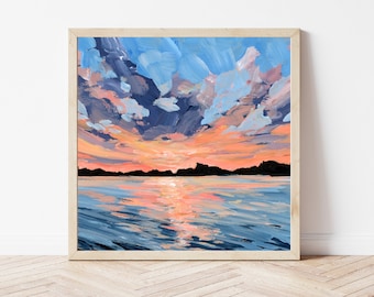 Puede incluir: Pintura acrílica de una puesta de sol sobre el agua, enmarcada en madera clara. El cielo es una mezcla de tonos azules, melocotón y naranja, con pinceladas que sugieren nubes. El agua refleja la puesta de sol.