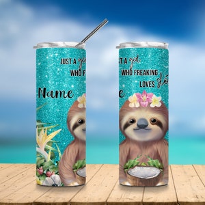 May include: A turquoise glitter tumbler with a sloth holding a coconut. The sloth has a flower crown and the text "Just a girl who freaking loves sloths" is on the tumbler.